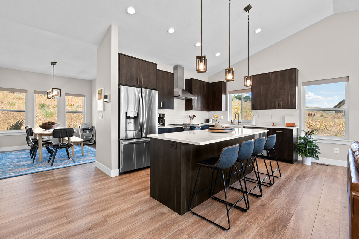 Open-concept kitchen and dining area keep everyone connected, whether cooking, dining, or relaxing together.