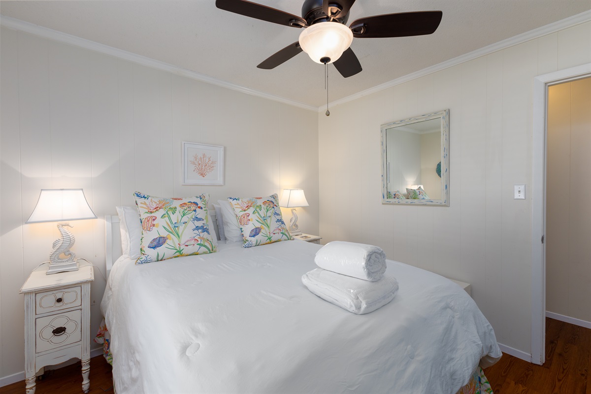 Queen-size bed in Bedroom 1