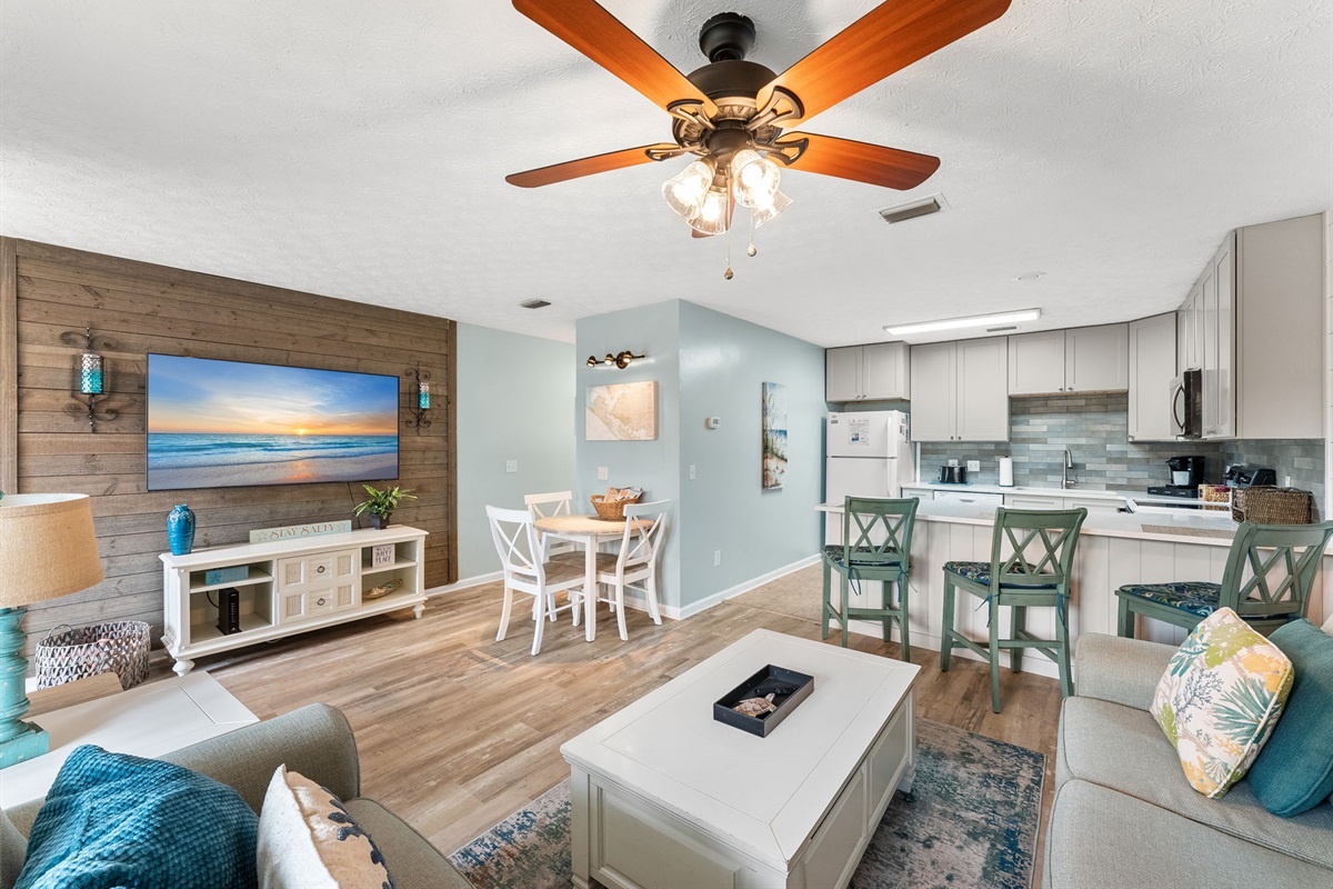 Cozy coastal living area featuring new sofas and sleeper sofa for extra guests.