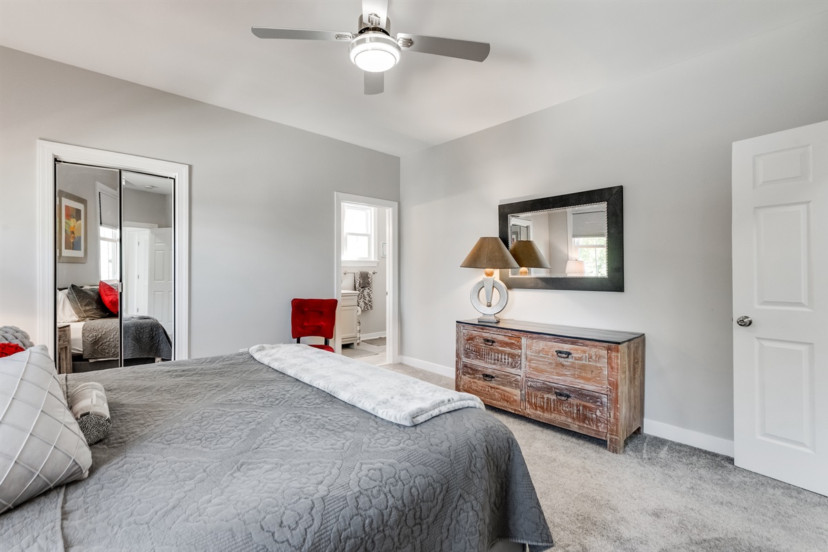 King Bedroom 1: Relax in this stylish room with chic decor and elegant lighting!