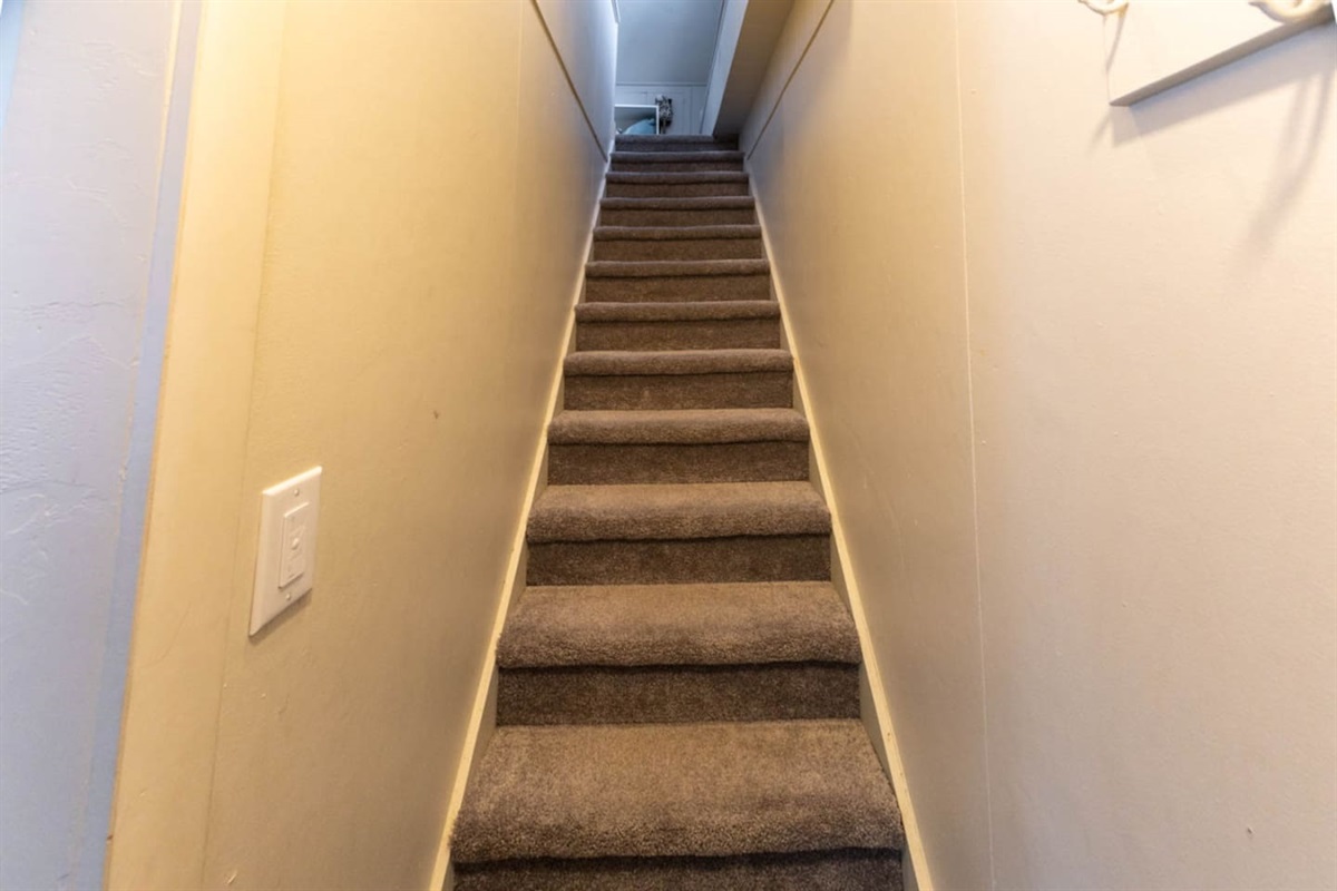 Narrow stairway leading to Upper Level