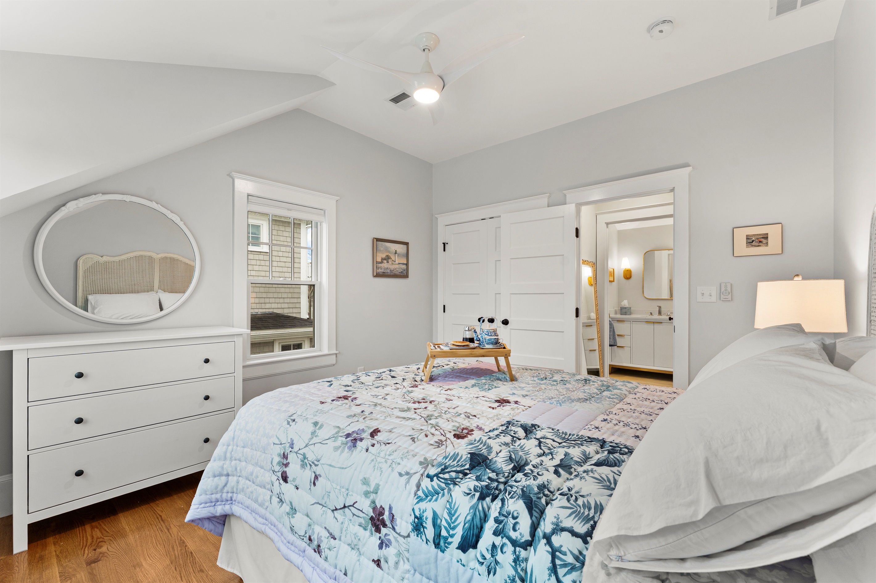 First bedroom featuring a comfortable queen-size bed