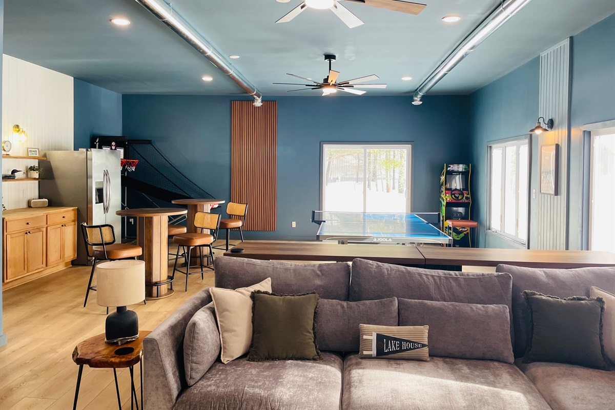 Cozy seating area with large sectional and power recliner