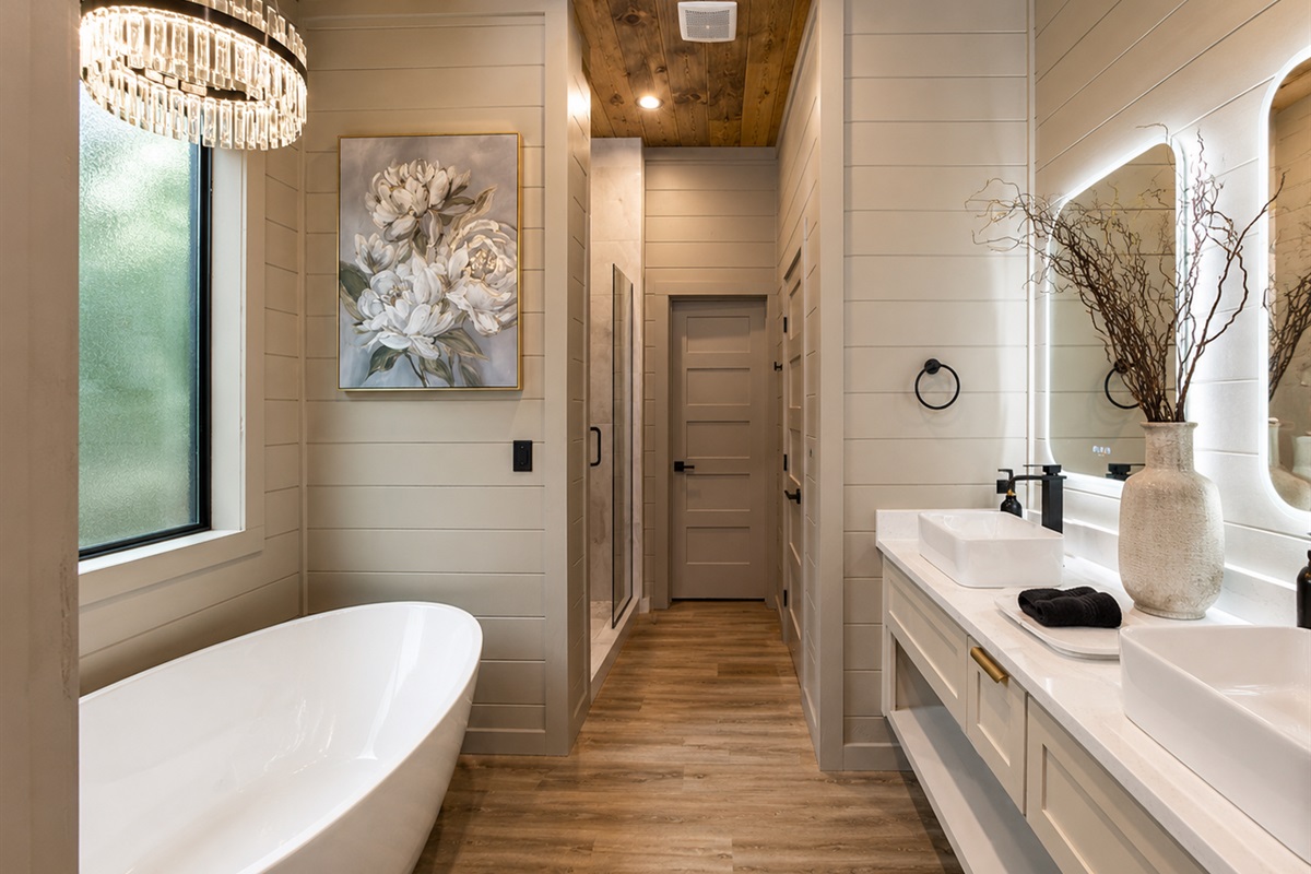 Luxurious Bath Oasis: Indulge in elegance with a soaking tub and modern decor!