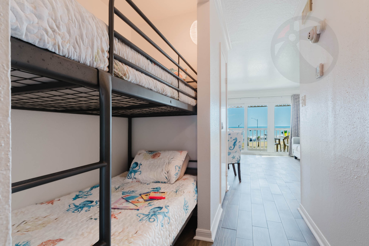 Across from the bedroom are the twin bunks