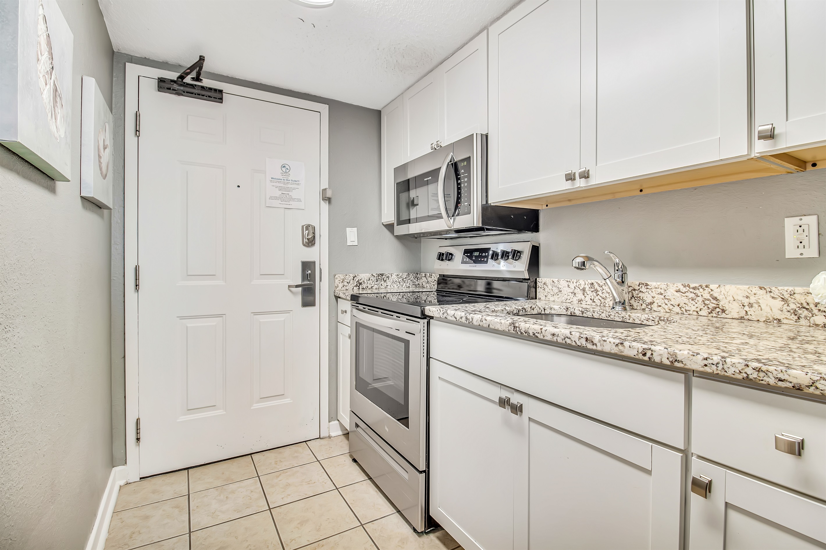 Immerse yourself in a contemporary coastal kitchen, featuring clean lines, sophisticated finishes, and a layout that maximizes both functionality and the scenic ocean view.