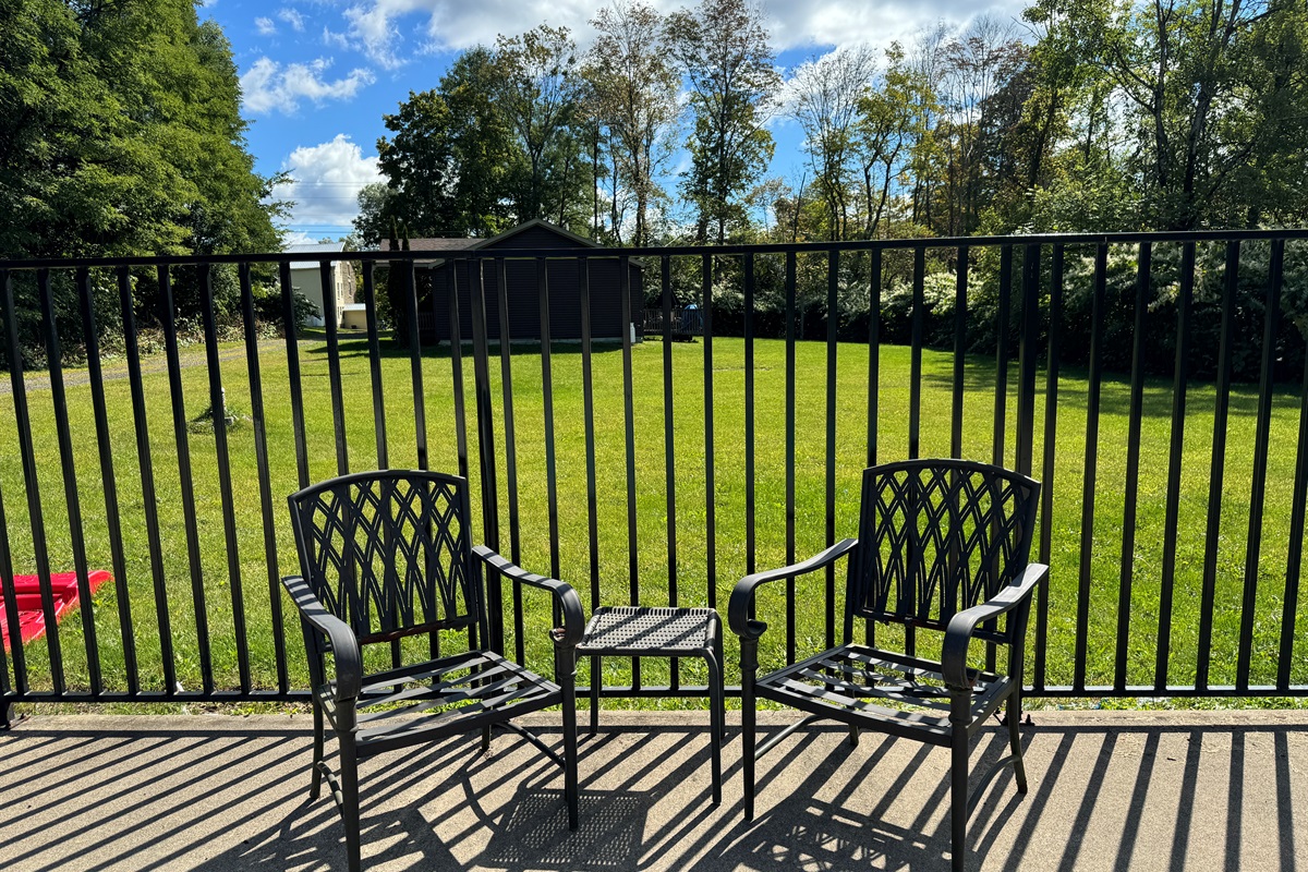 Sitting area at the shared (with two other rentals on site) heated slat-water pool. 