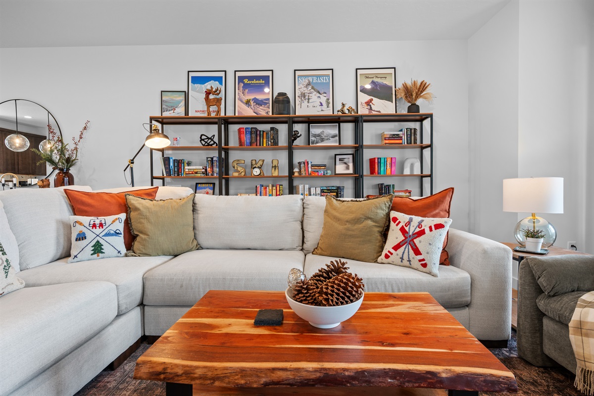 Inviting lounge space with cozy sofa and curated mountain-modern accents.
