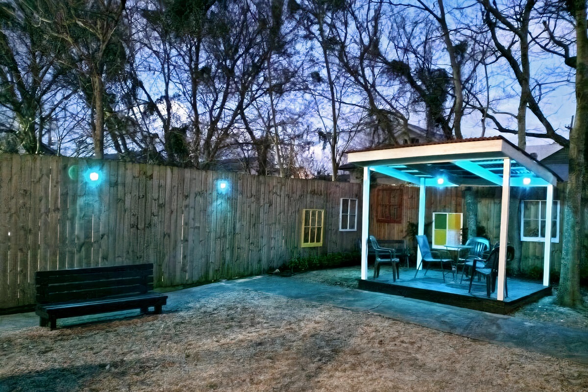 Rear courtyard shared with neighboring unit.