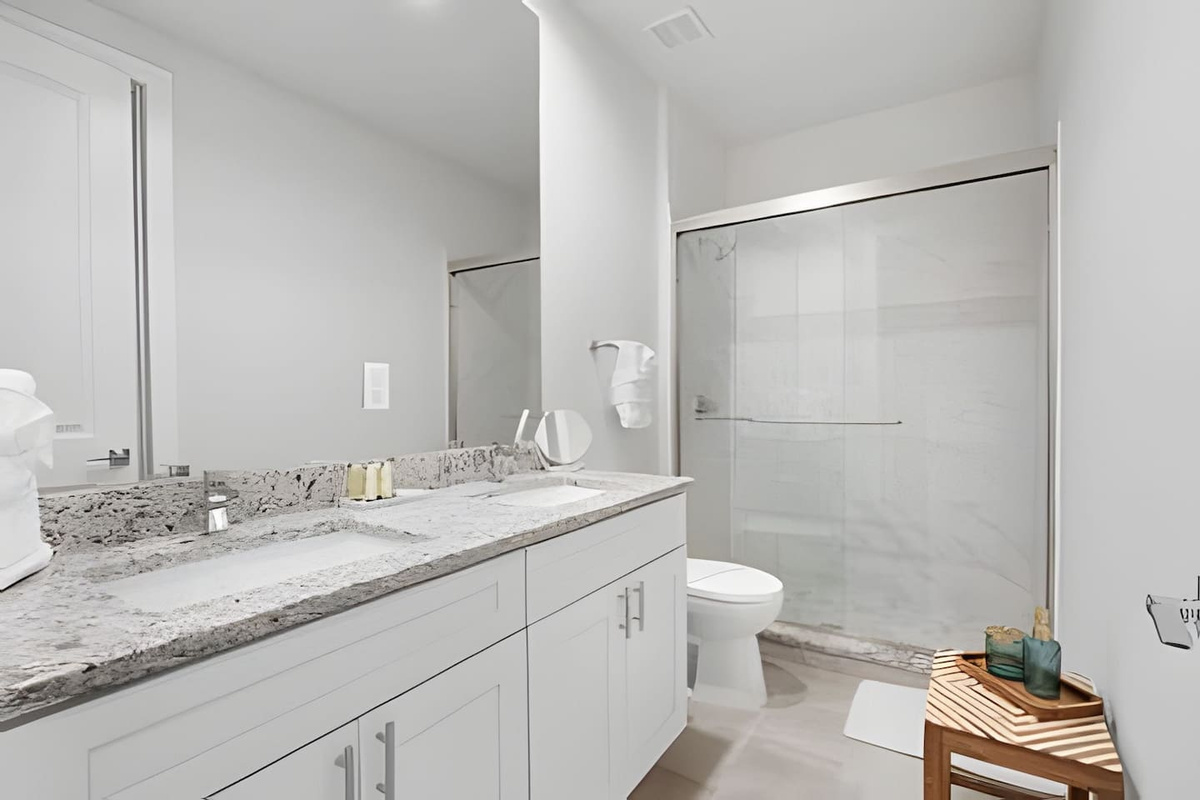 Enjoy a spa-like shower with premium fixtures and plenty of space for ultimate comfort.