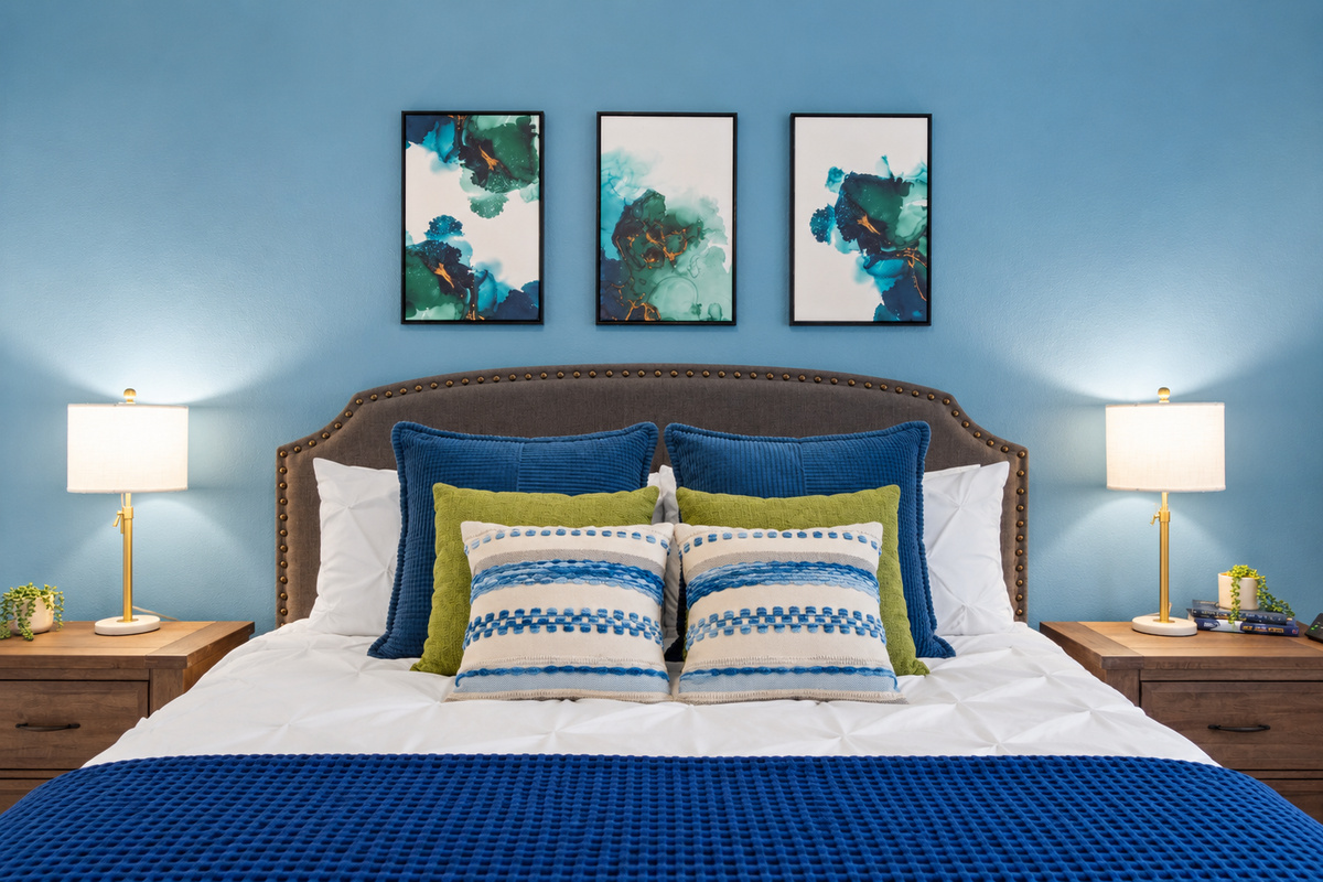 - Inviting bedroom filled with natural light and fresh blue and white tones   - Soft linens and cozy pillows create a perfect blend of comfort and calm   - A serene retreat ideal for recharging after sunny poolside adventures