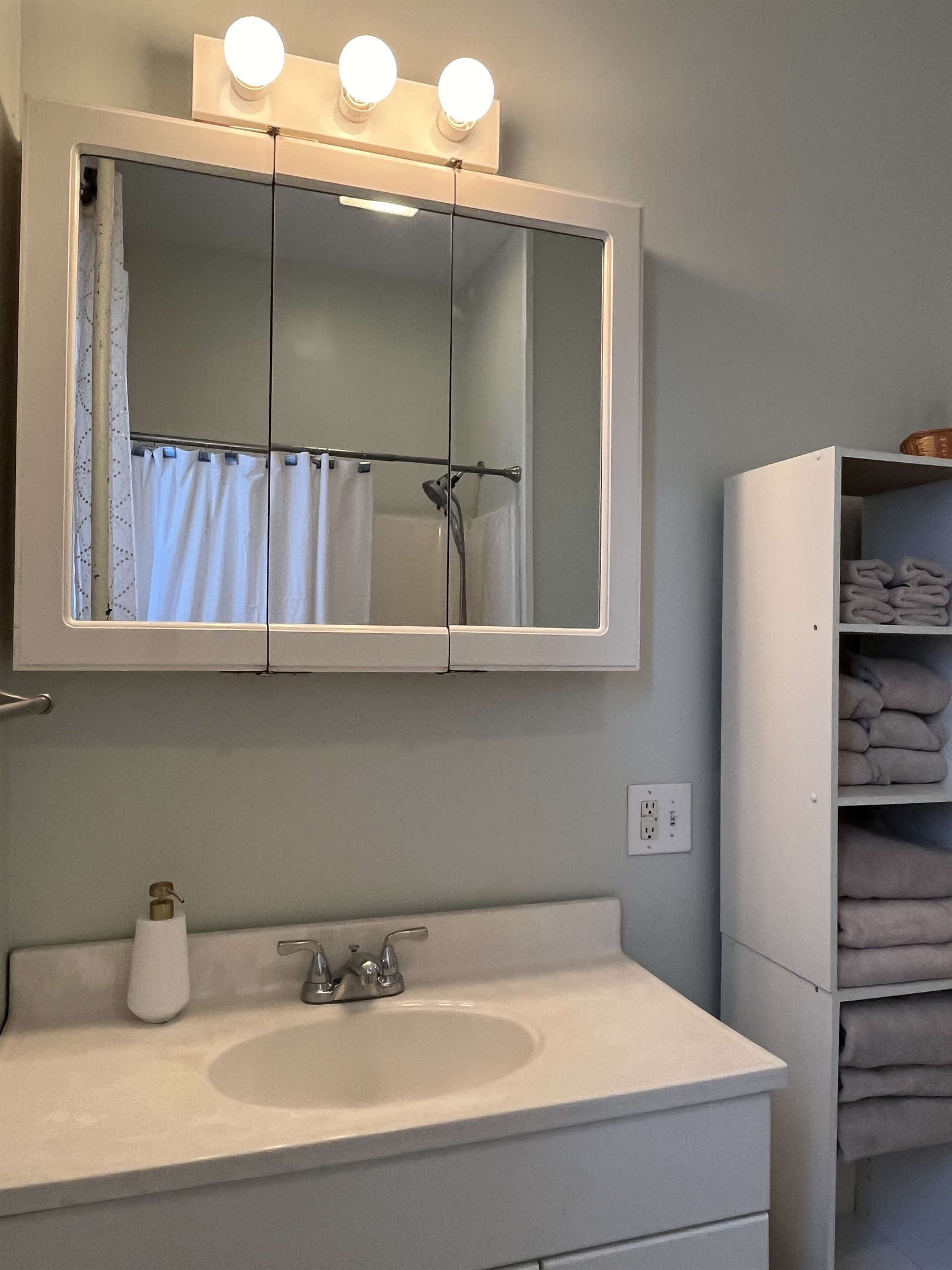 Bathroom with tub/shower, steps from each bedroom