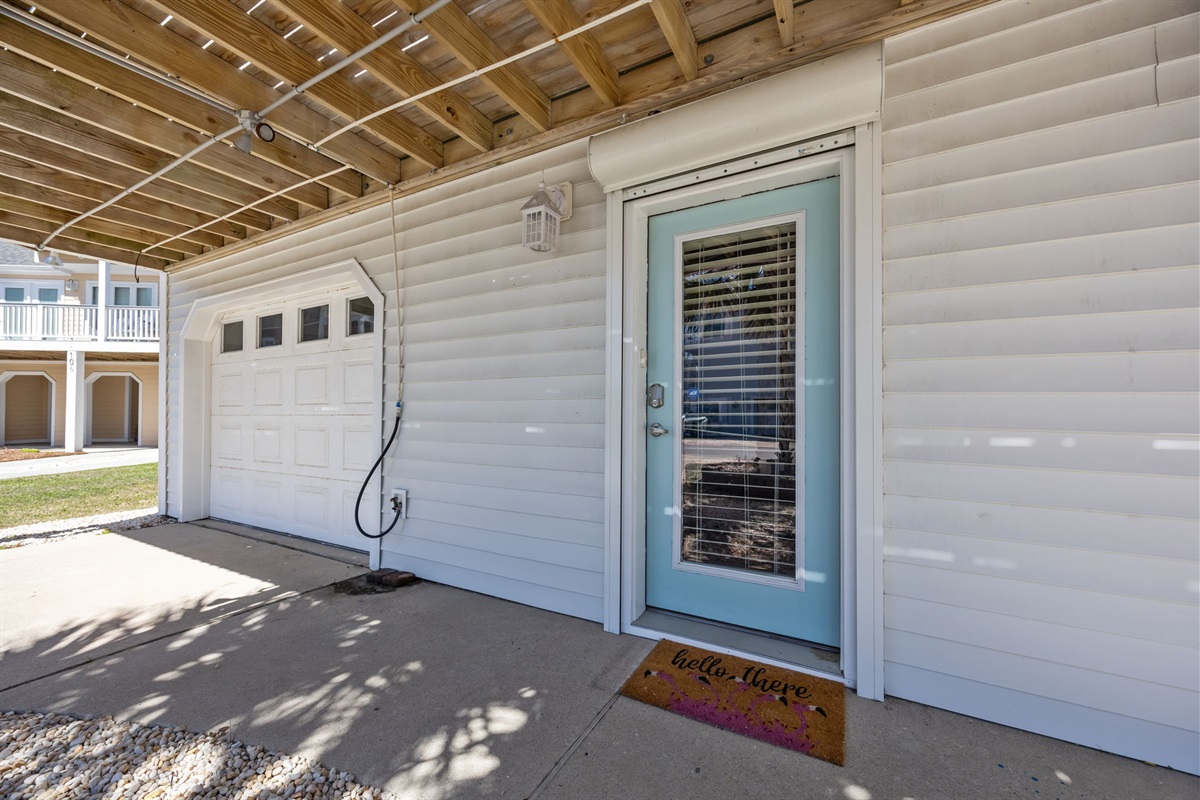 Private ground level entry with covered area and easy access to the home