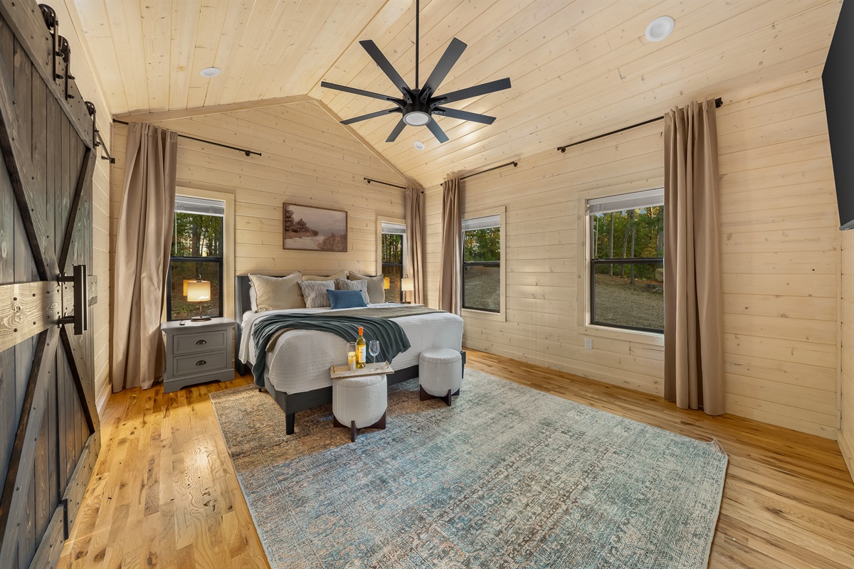 Evening in the king suite with a cozy rug underfoot and a tray set for a quiet night in.