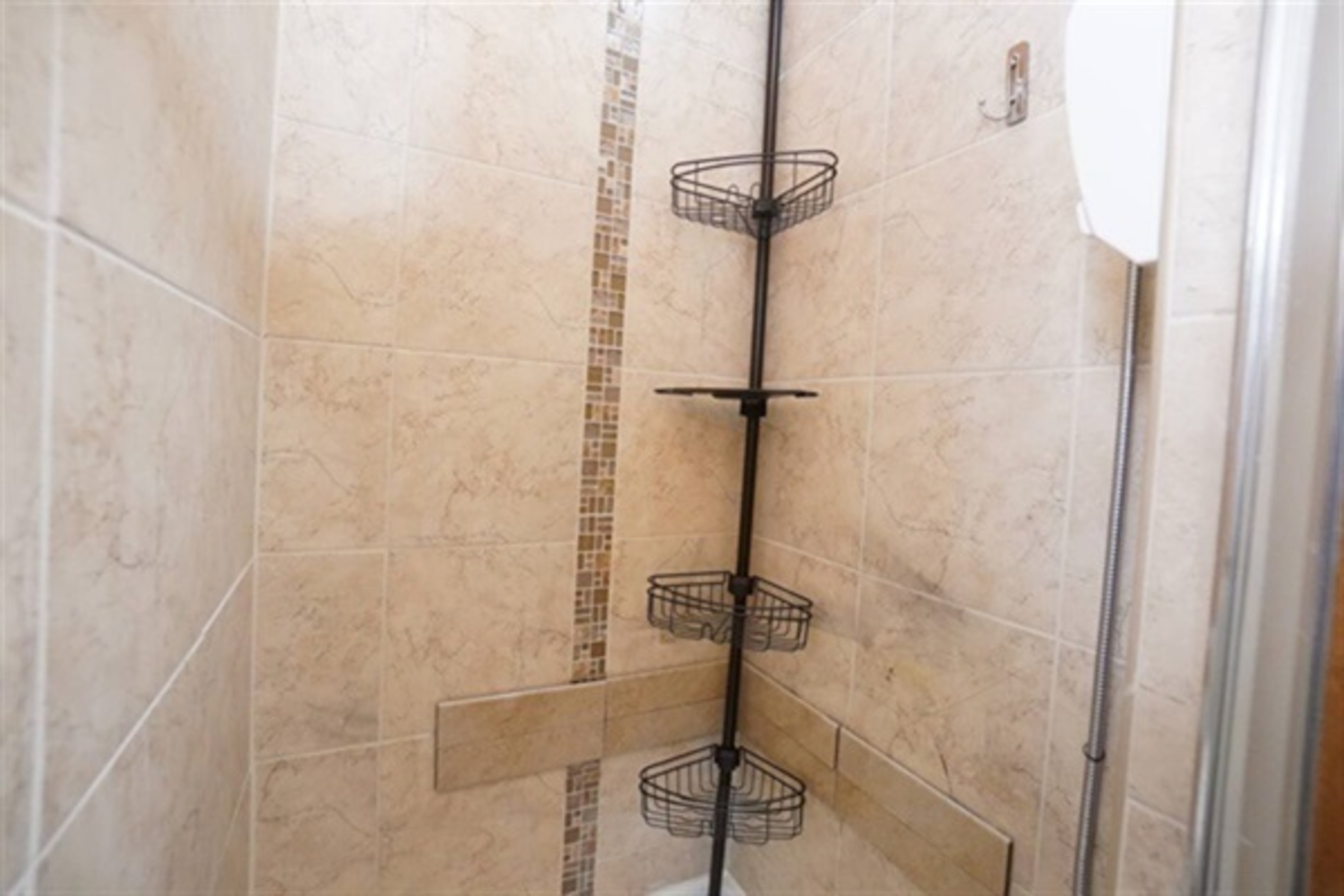 Enjoy a full-sized stand-up shower with exceptional water pressure