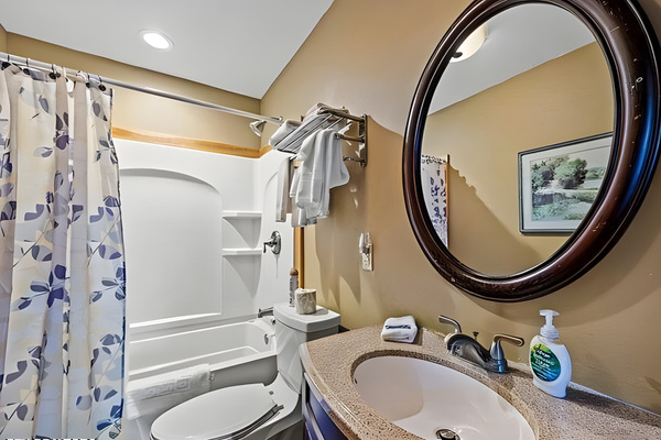 Connected directly to the primary bedroom, the full bathroom features a tub/shower combo.