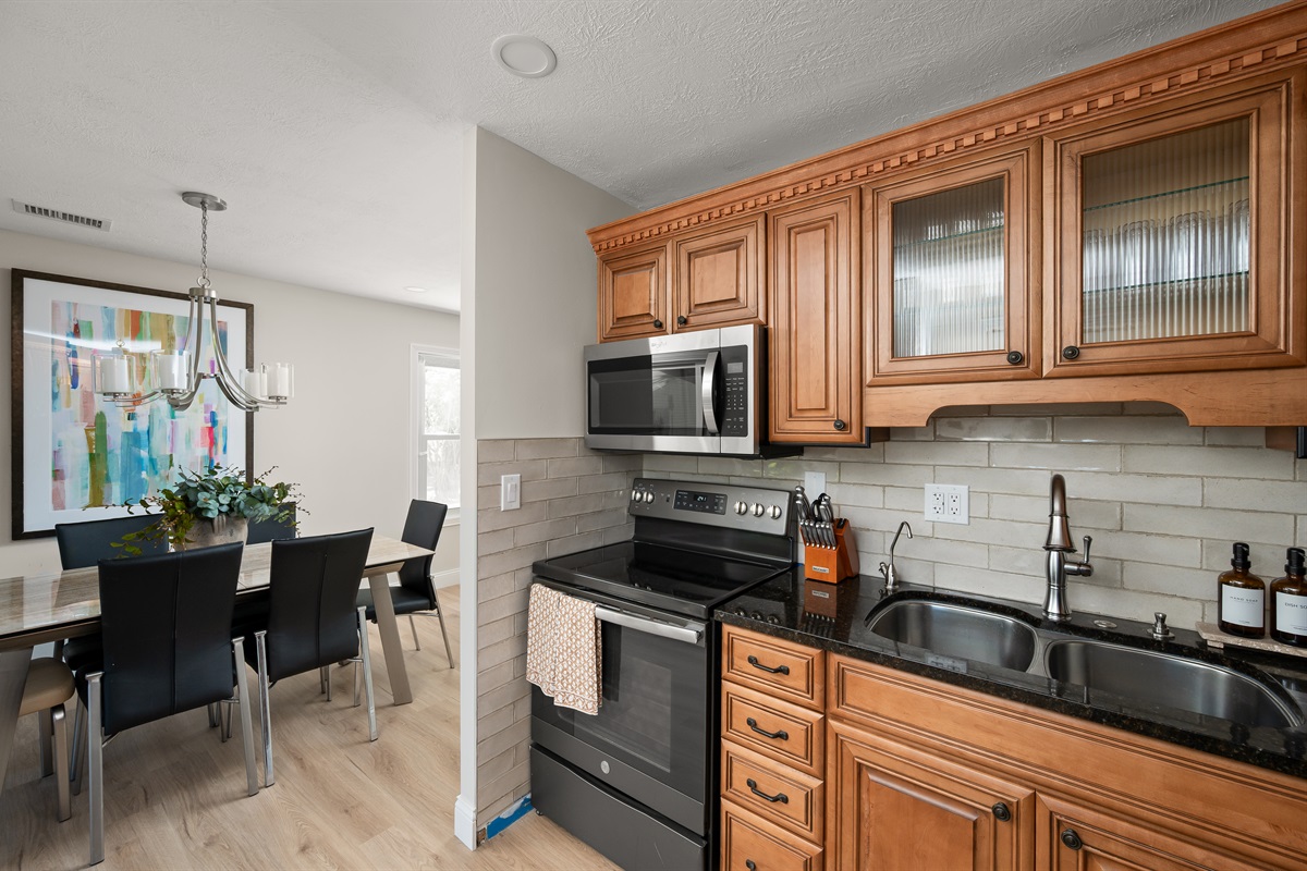 Open kitchen flows seamlessly into the dining area, perfect for cooking, entertaining, and staying connected with family and friends.