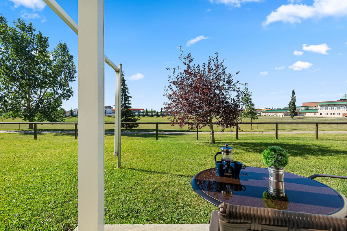 
Enjoy your morning coffee with the park views. The path in the picture is connected to miles of paved pathways for walking, running or biking though natural parkland.  
