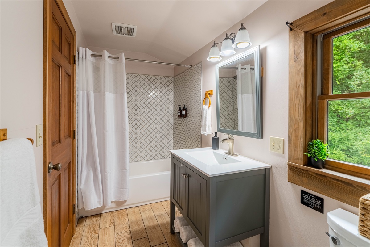 Bright, updated bathrooms stocked with plush towels and spa-quality amenities.
