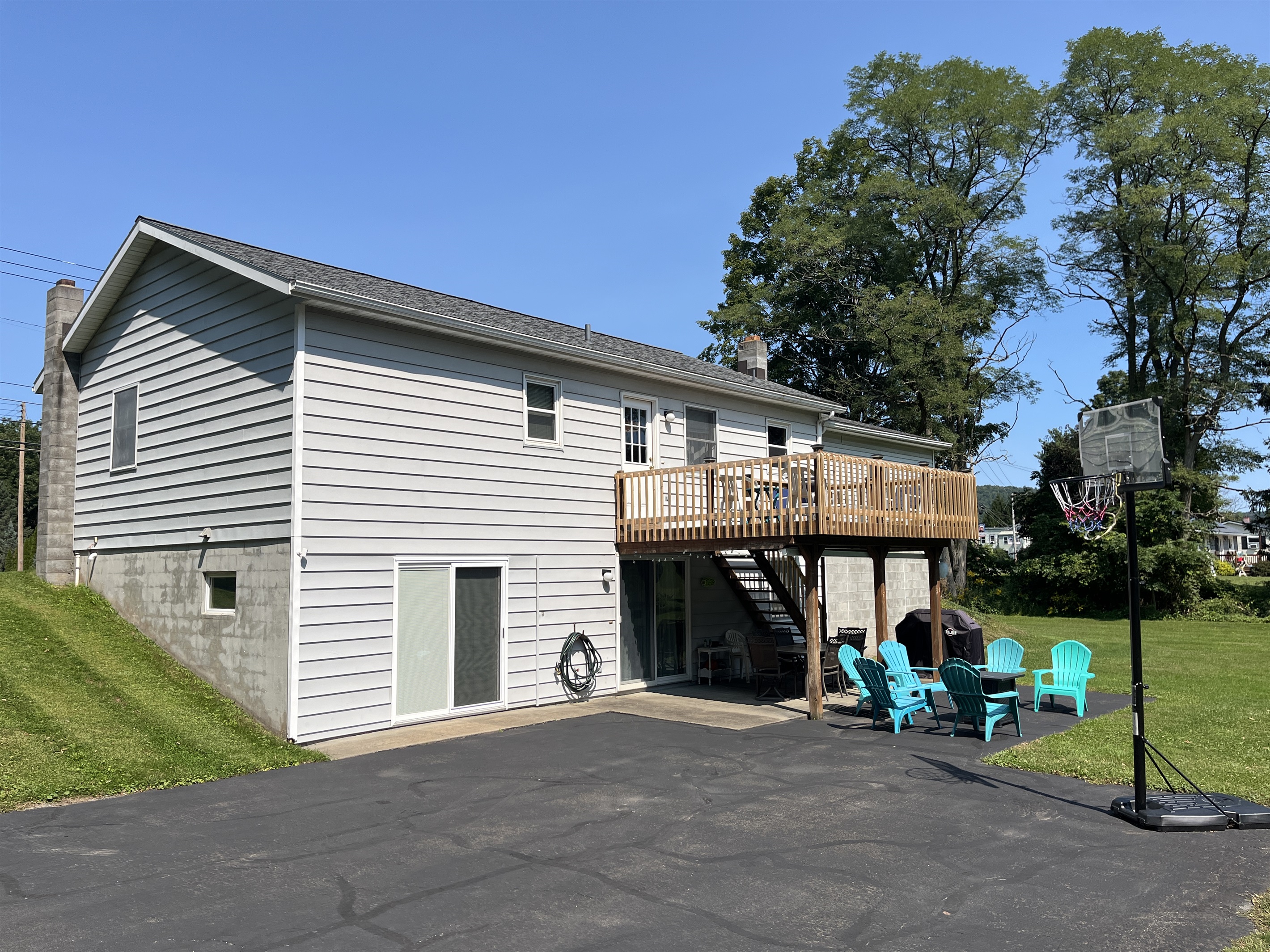 Rear deck, patio, and lawn