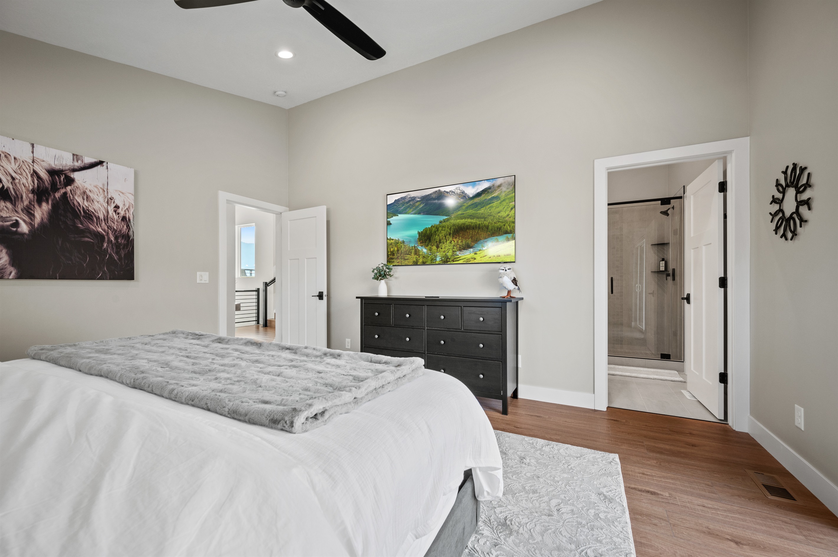 Big-screen entertainment, elegant furnishings, and private bath access make this room a true escape
