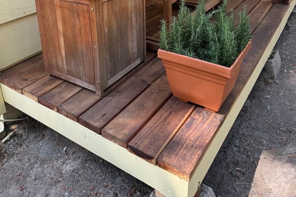 Curl up and read or drink your favorite beverage on the porch glider or rocker. There is a great space right out front to set up our cornhole or ladder ball sets too. 