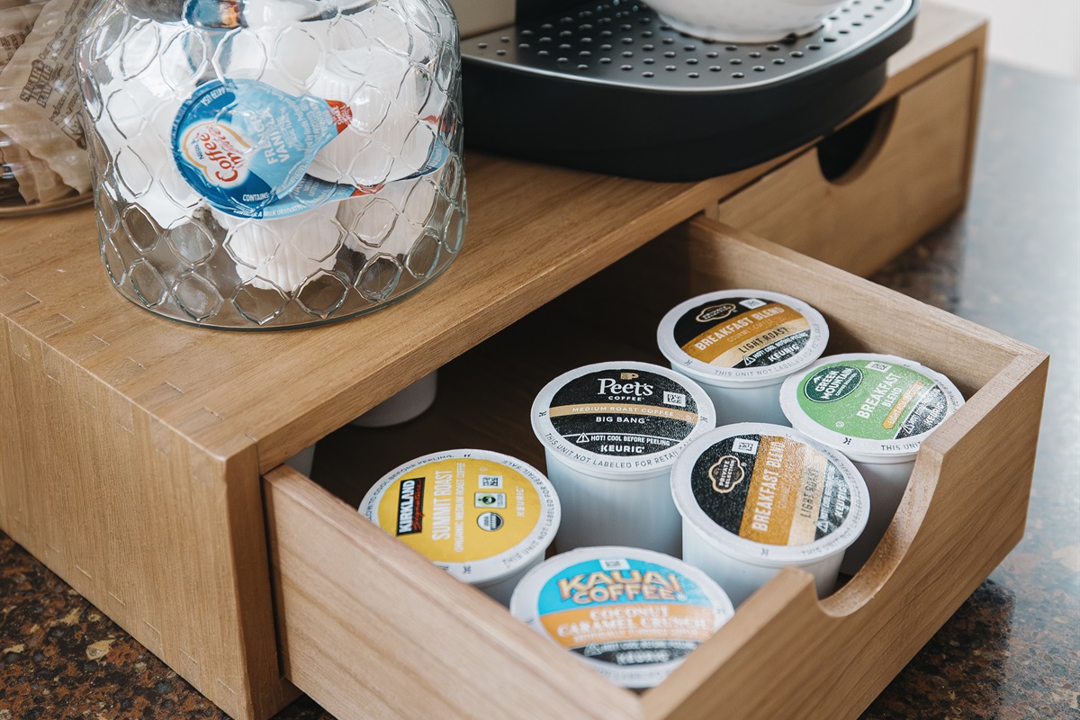 Fully stocked Keurig coffee bar with a variety of pods, creamers, and mugs—perfect for slow mornings or fueling up before skiing, hiking, and lake adventures in Pinetop.