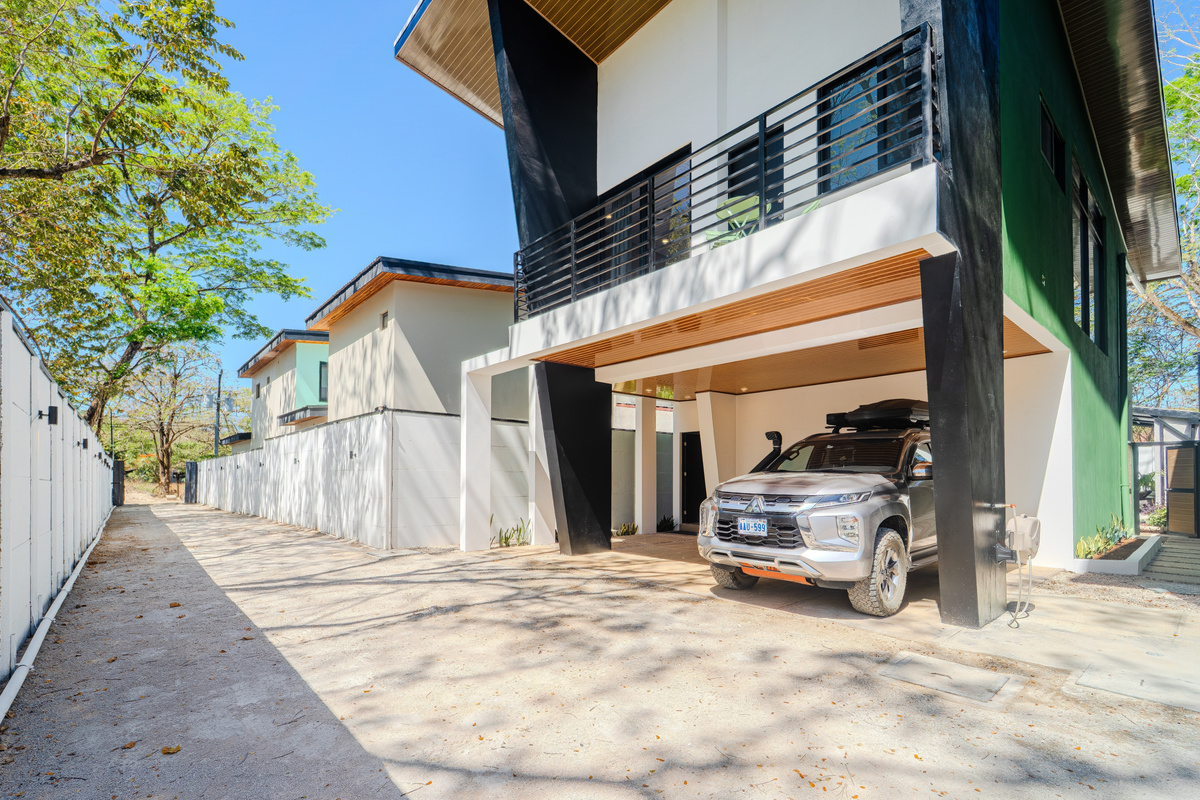 Casa Ola from the street. Covered carport, private parking.