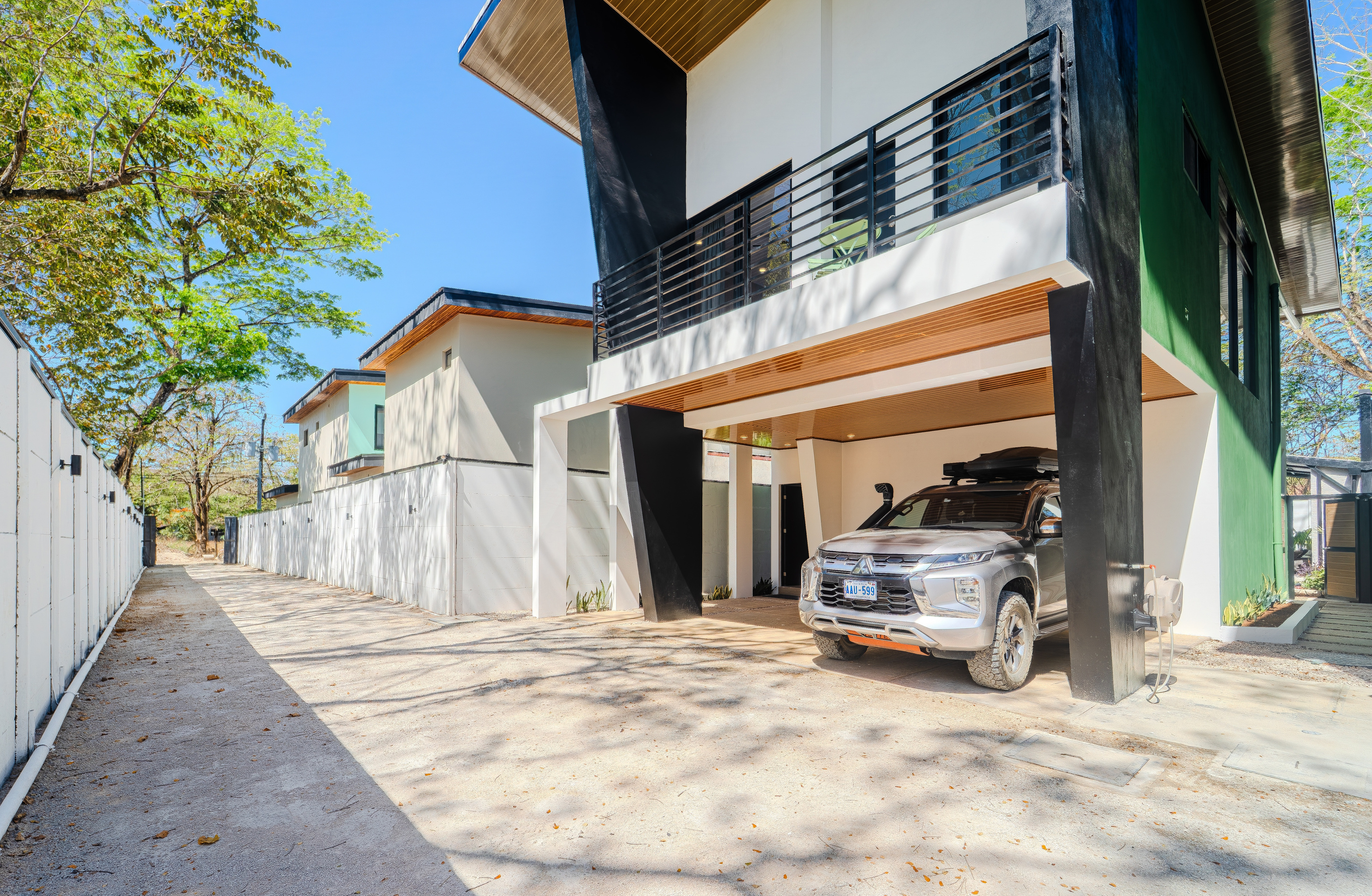 Casa Ola from the street. Covered carport, private parking.