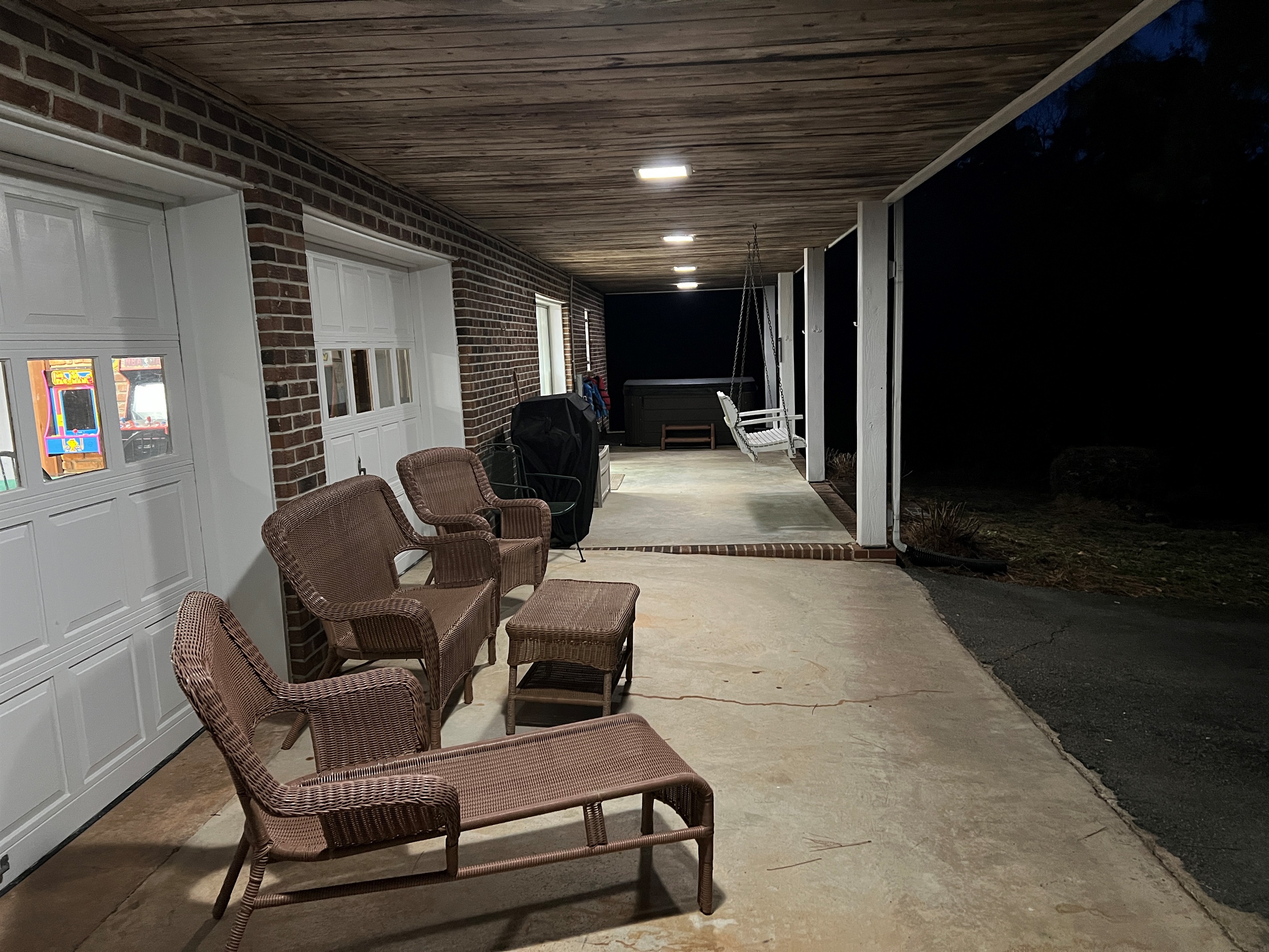 Plenty of sating on the covered patio, looking out to the lake