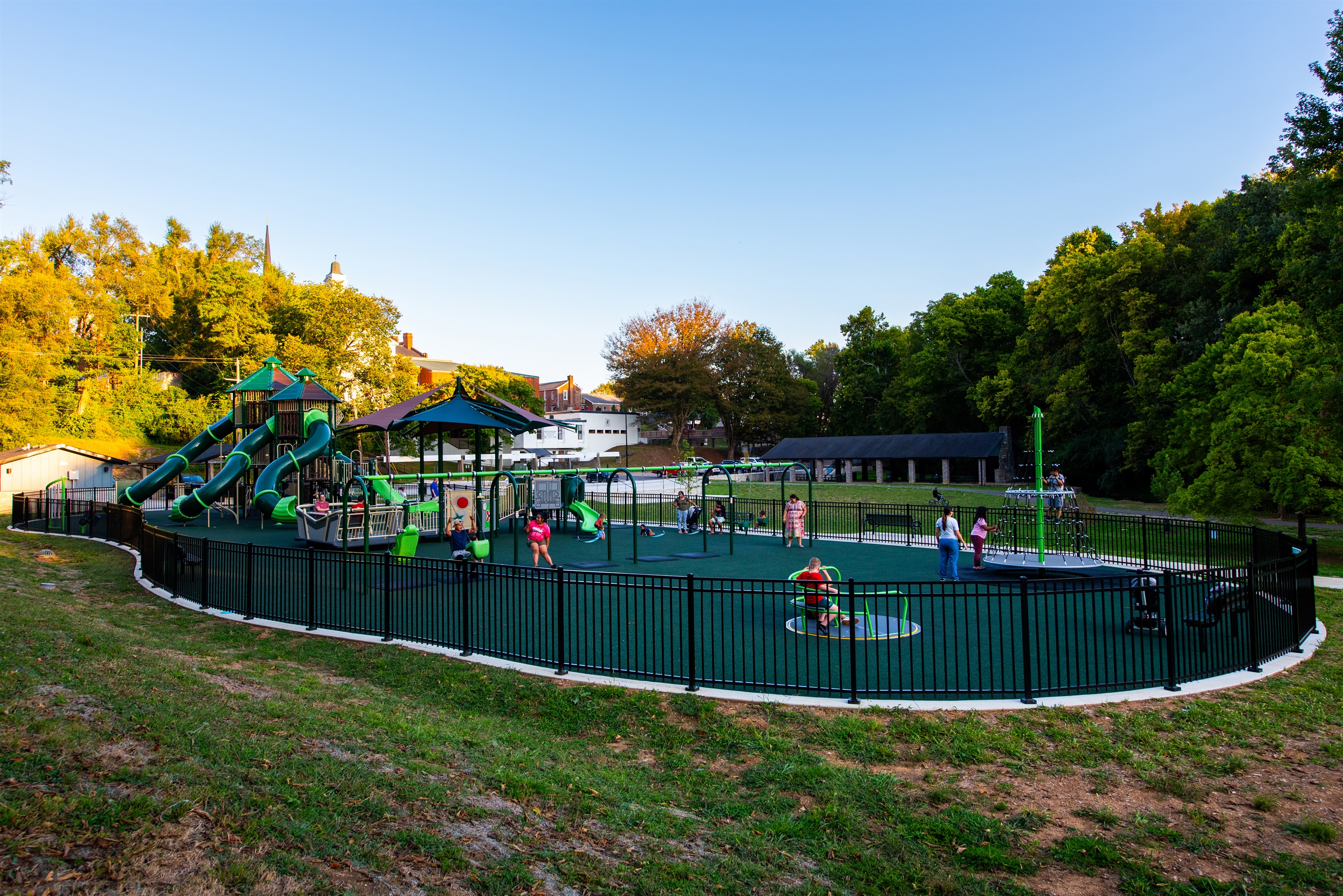 Big Springs Park features a family-friendly playground with slides, swings, and climbing structures that kids love. It’s a safe, shaded spot for little ones to burn off energy while parents relax nearby in the park’s open green space.