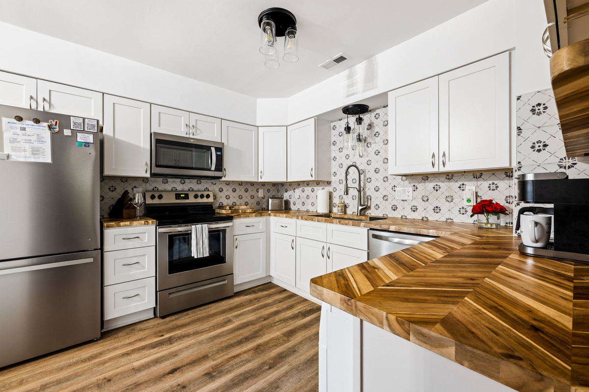 The Wolfpack kitchen is fully stocked with cookware, dishes, and the essentials needed to prepare meals.