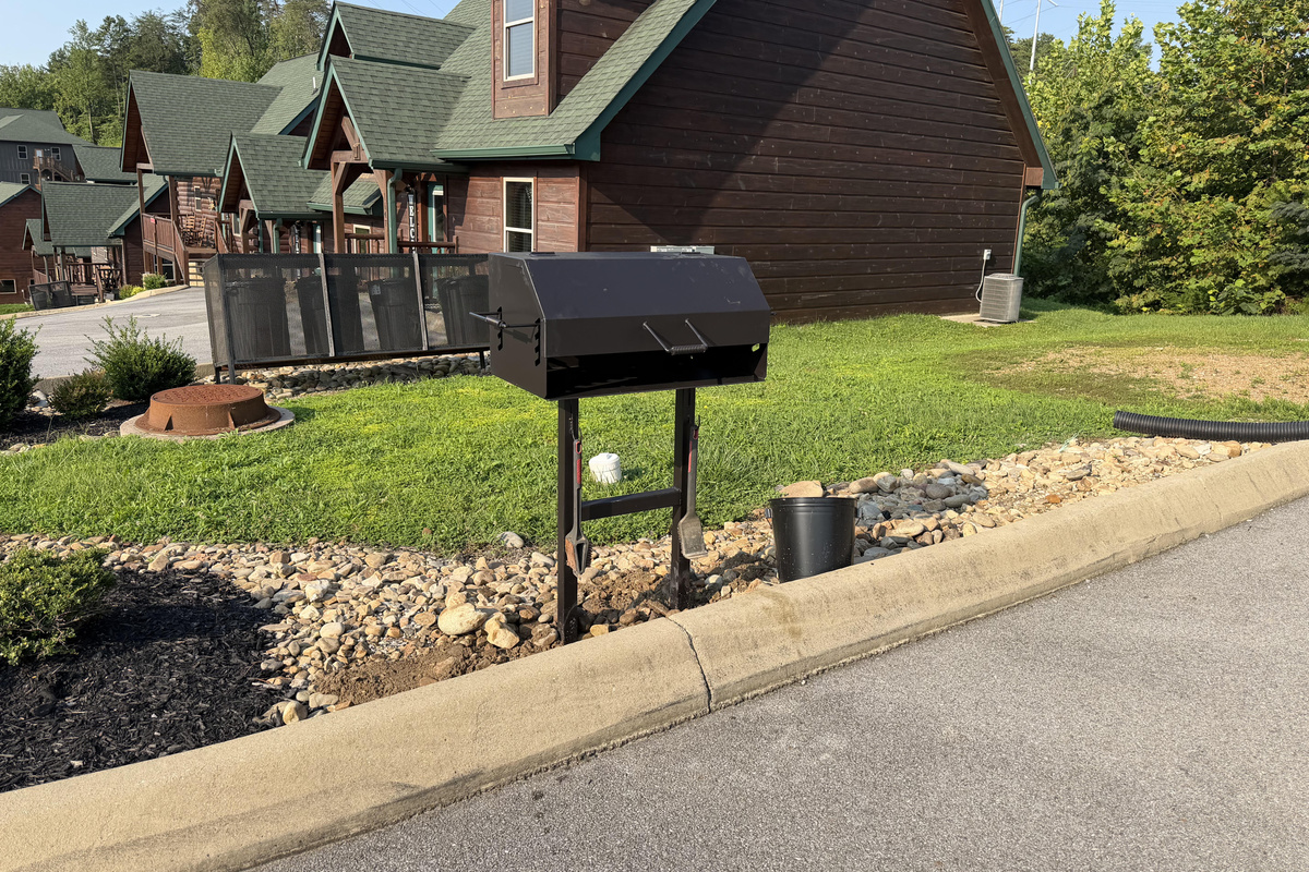  30"x18" charcoal grill with lid — perfect for family cookouts. Please bring your own charcoal.