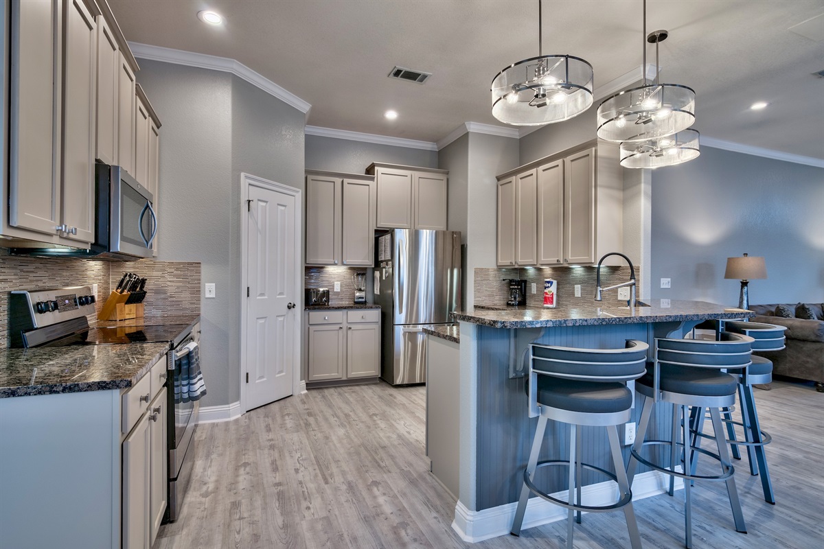 Granite counters and Stainless Steel Appliances and eat-in kitchen