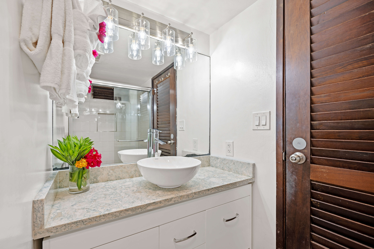 Refreshing walk-in shower featuring a bright and comfortable space to unwind.