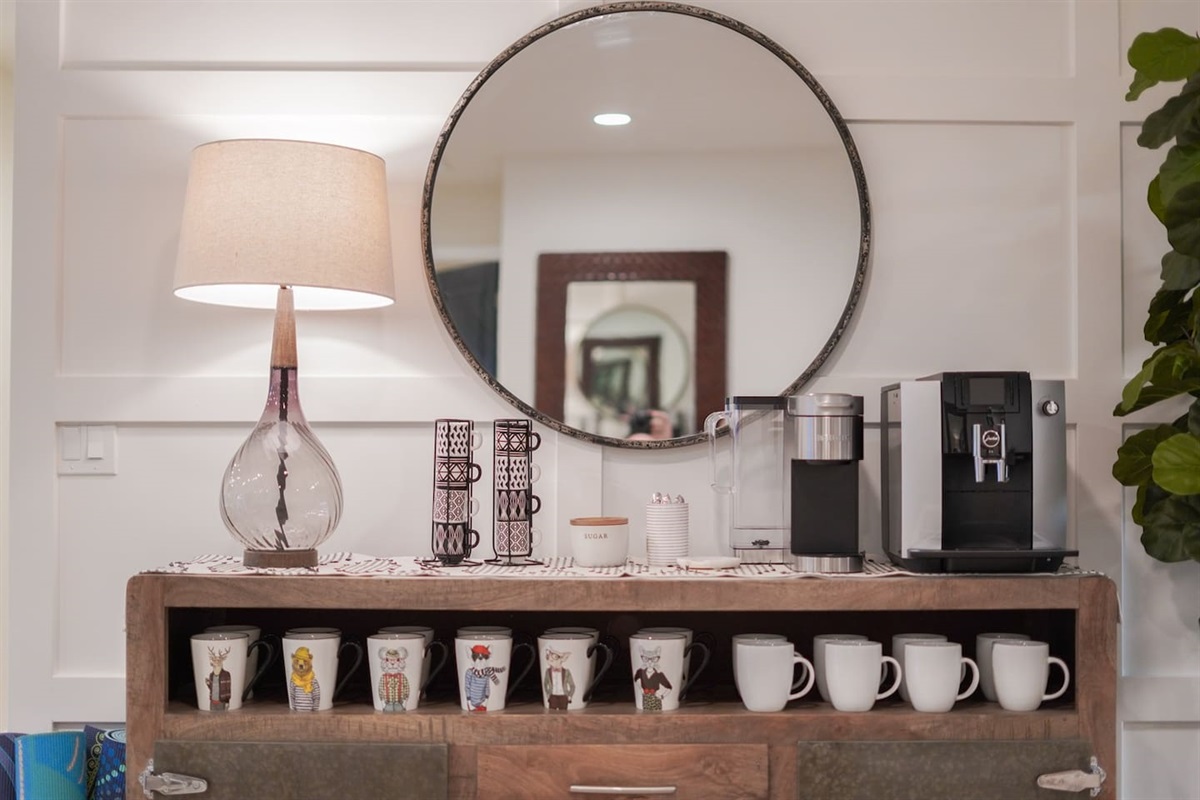 Start your day in the cozy coffee area, filled with plenty of mugs, perfect for enjoying your favorite brews and sharing moments with friends and family.