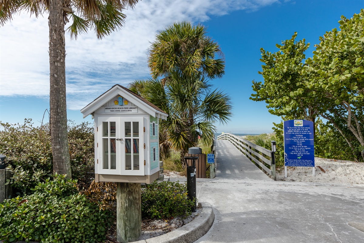 Relax on the beach with a book from one of our mini libraries located near the beach