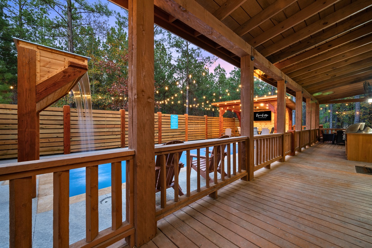 A walkway runs along the side of the pool, connecting all your favorite hangout spots and making it easy to move between them.