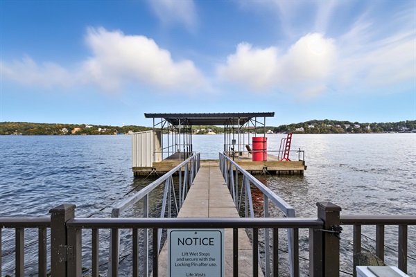Private dock with boat slip for swimming, fishing, or water taxi pickup