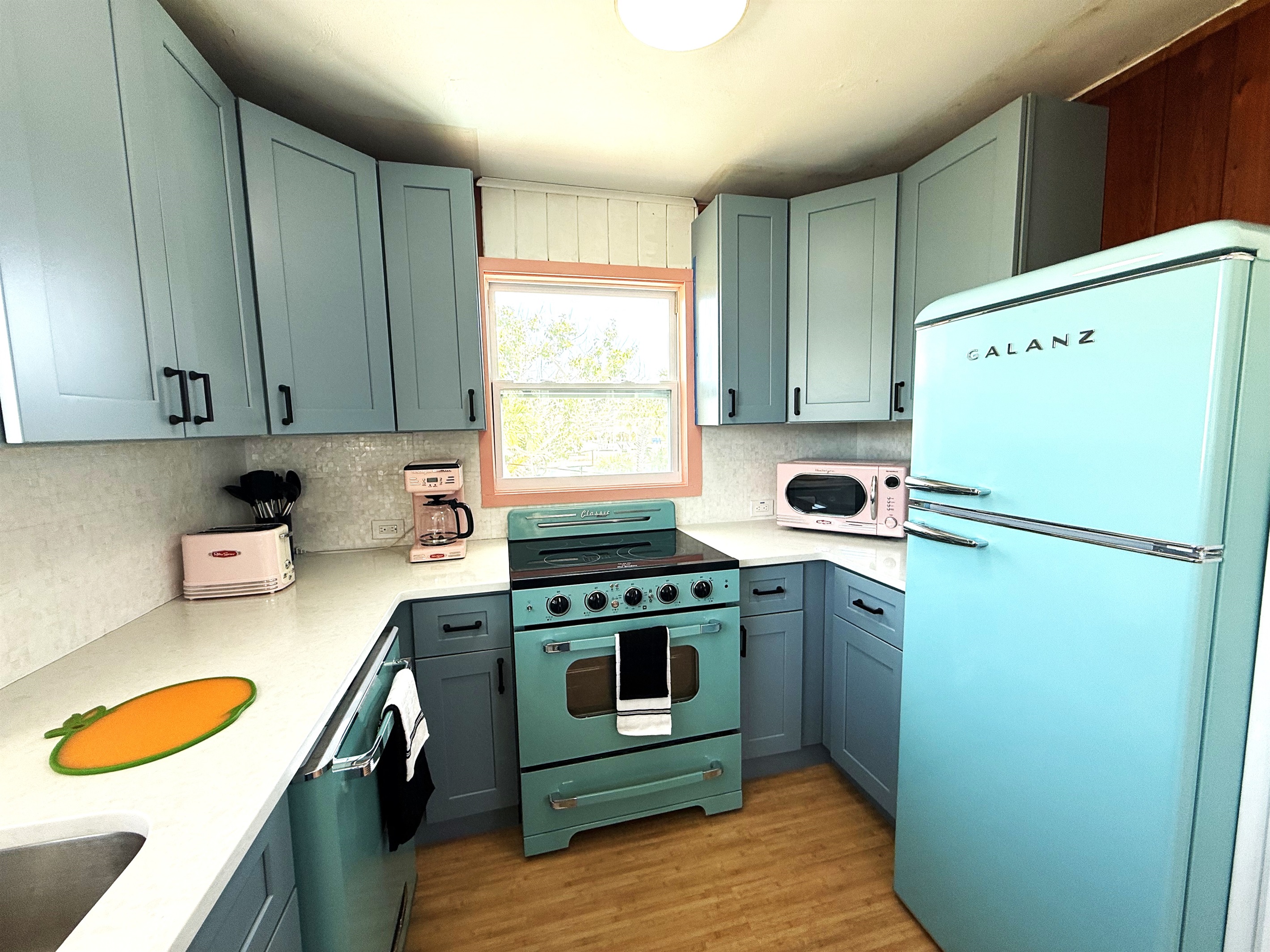 Retro Kitchen with Pale Blue, Sea Foam & Pink Appliances