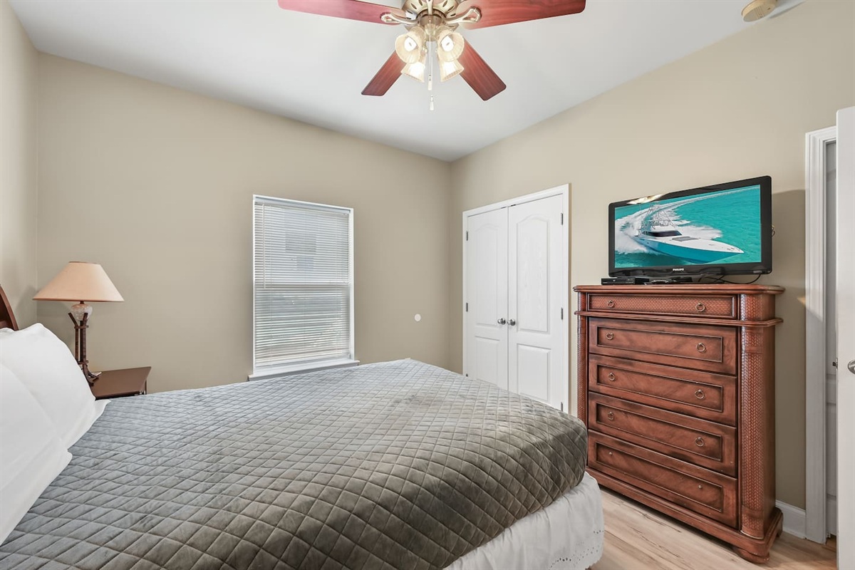 BEDROOM #5 + BATHROOM #5: Queen Bed with night stands, dresser, and TV. This bedroom has a private b