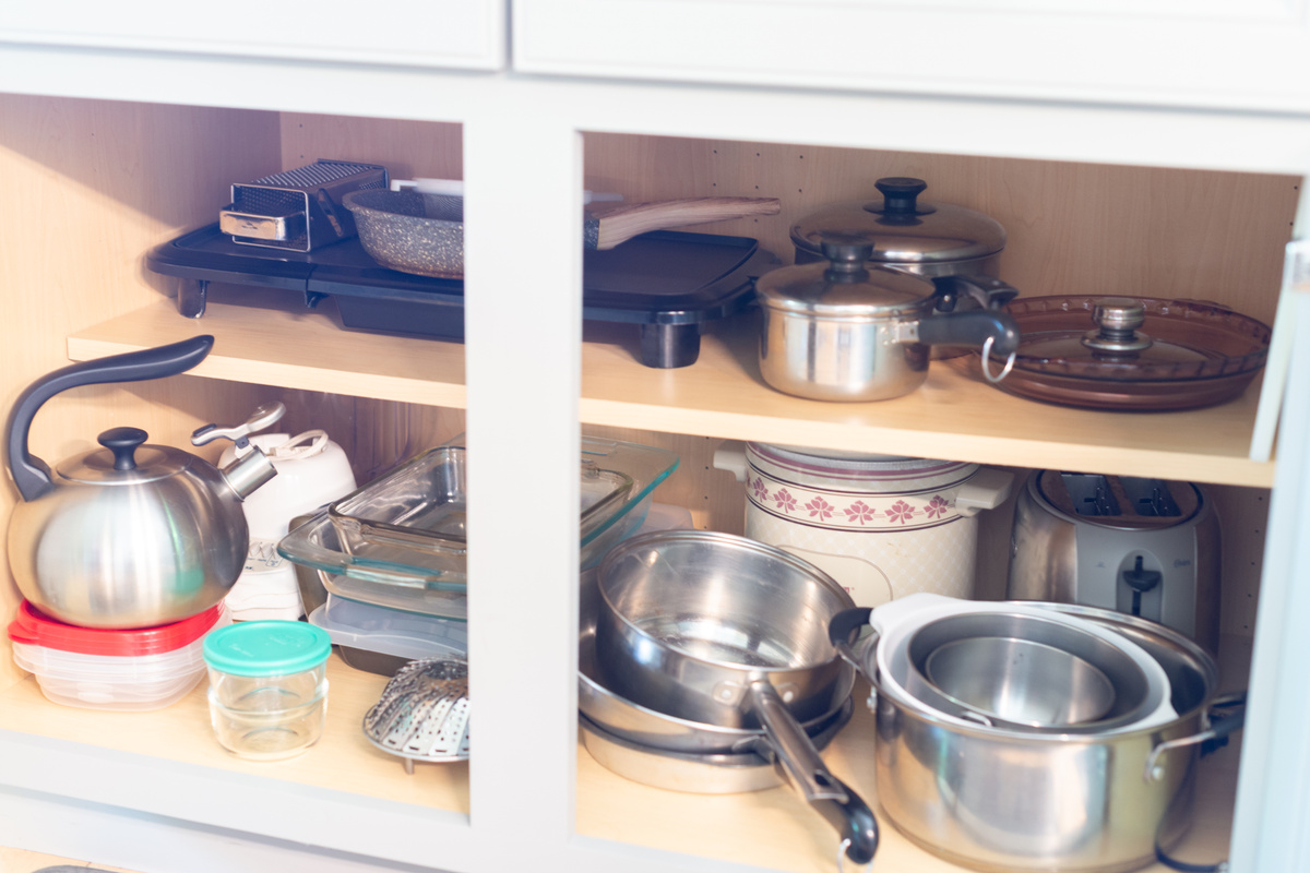 Fully-equipped kitchen with griddle, crockpot, mixer, toaster, well-maintained cookware