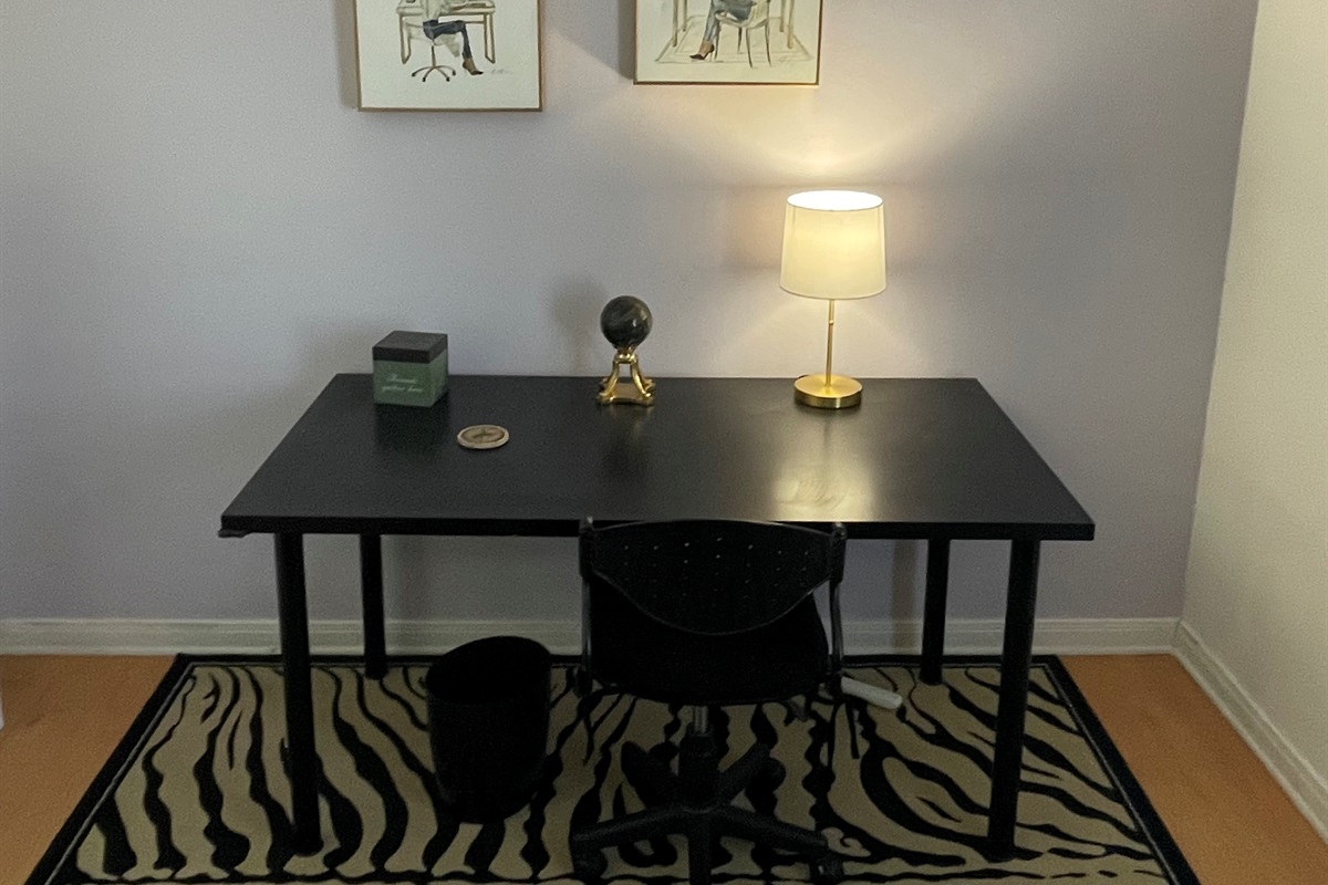 Well lit, private office space with comfy office chair, power strip.