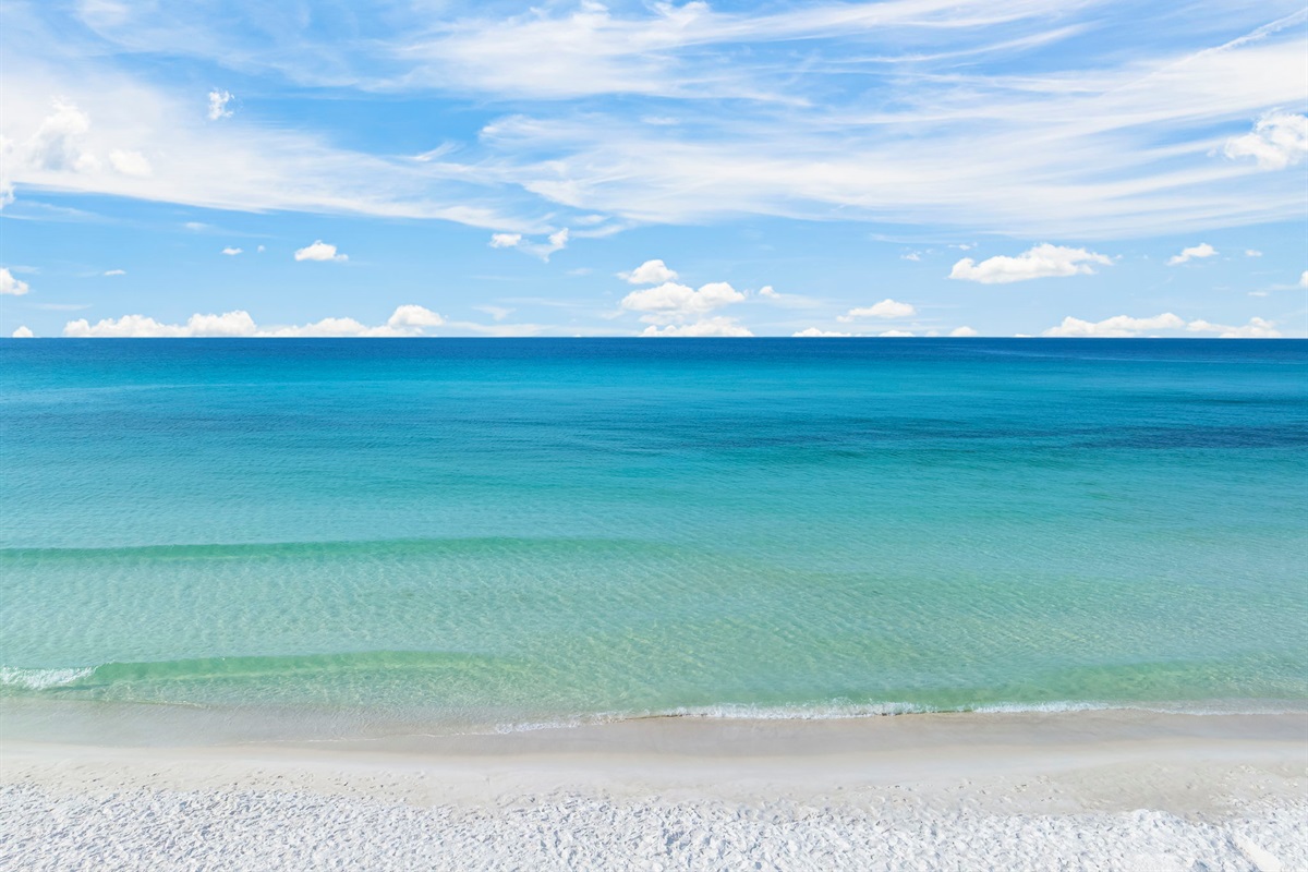 Wake up, walk out back, and you’re on the beach — the Gulf is your backyard here at Cast A Waves.