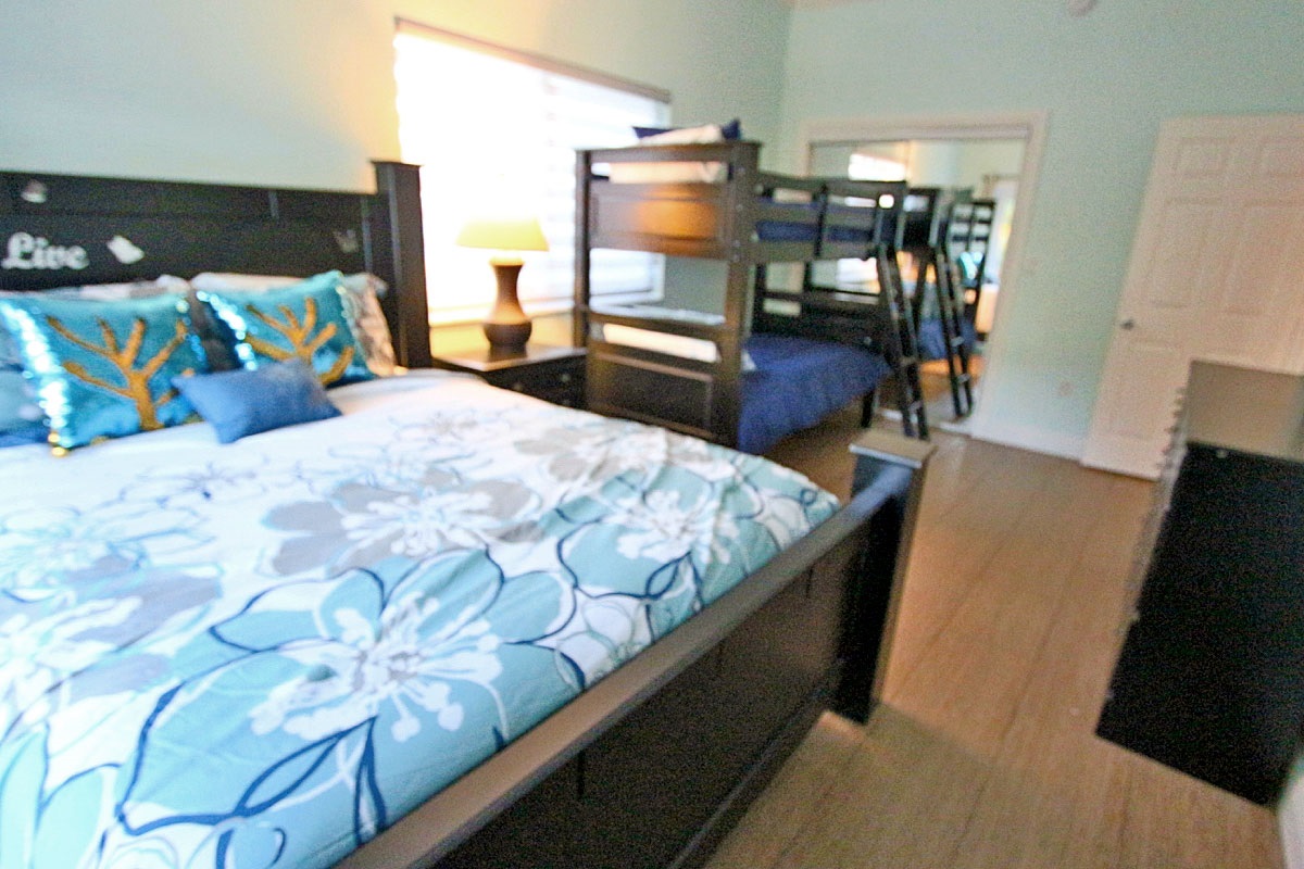 Queen bedroom with twin bunk beds