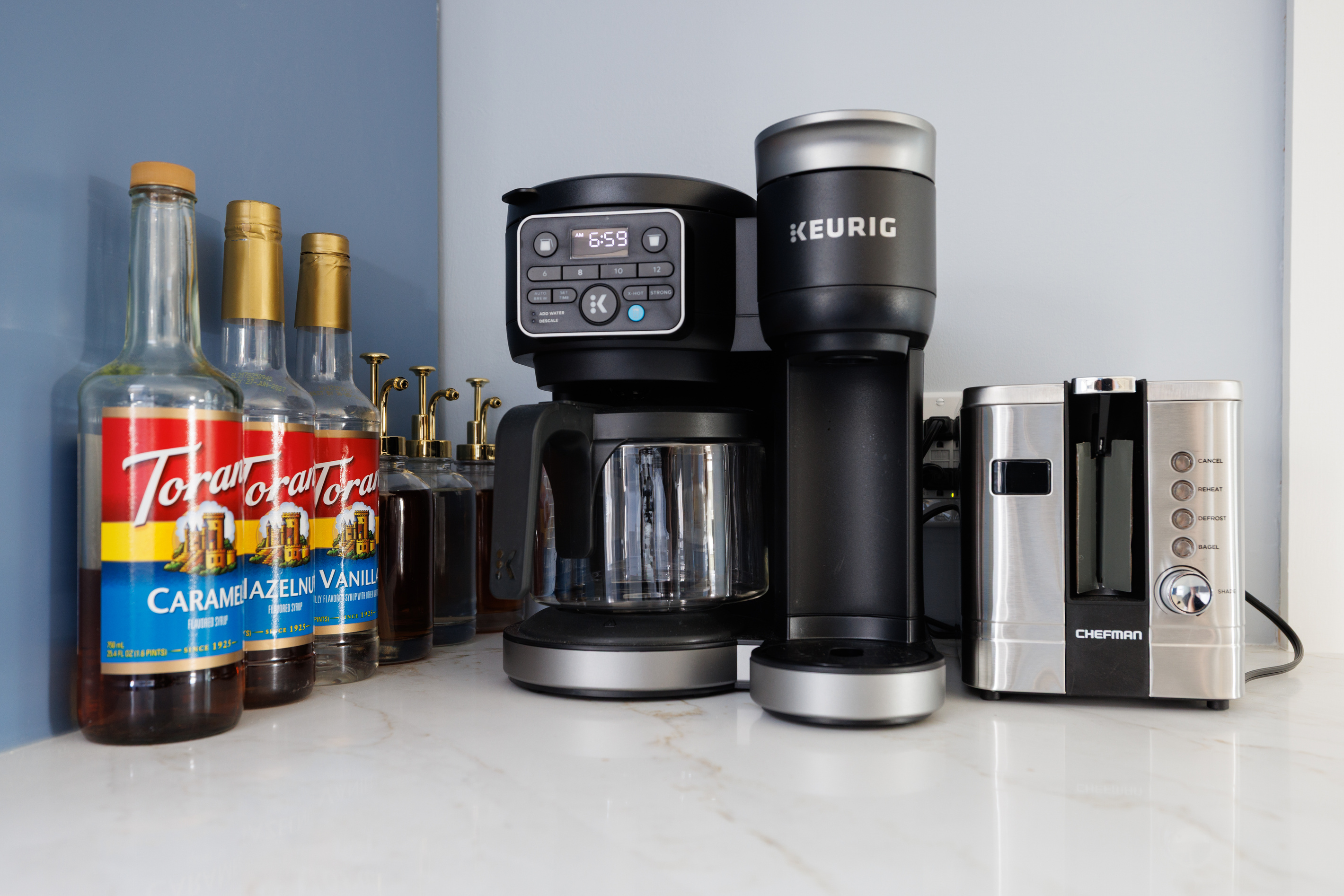 Coffee station running a Keurig and a drip maker simultaneously, mugs for the whole group — mornings start before anyone has to think about it.