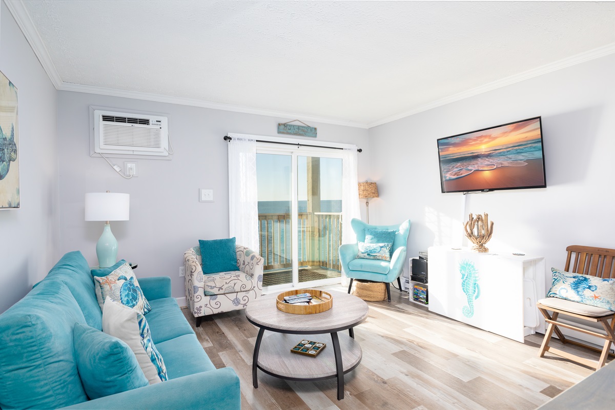 A seaside living room with vast ocean vistas