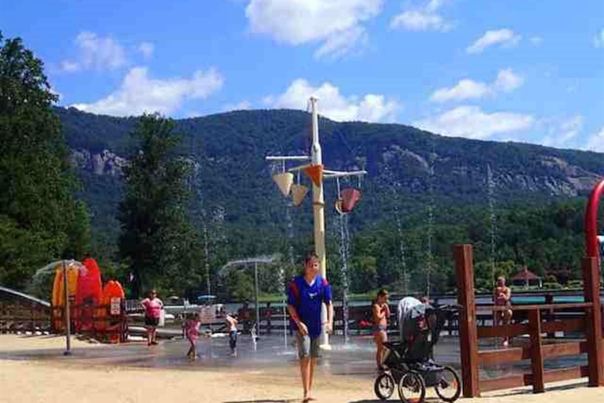 Lake Lure beach and children's water park with water slides.