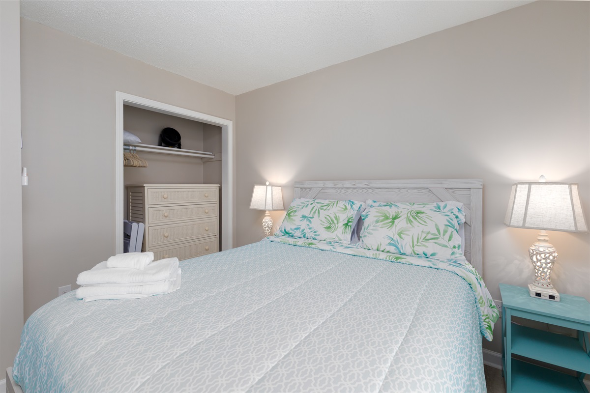 Queen-size bed in master bedroom