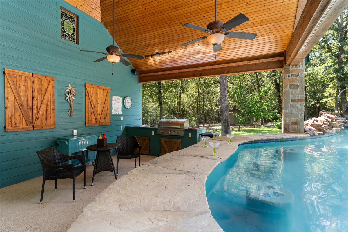 The pool is a hub of fun and relaxation, featuring rafts, pool toys, swim vests, and noodles for endless enjoyment. With a swim-up bar, rain curtain, waterfalls, a jump-off pad, and a hot tub, it’s perfect for lounging, playing, or creating memories.